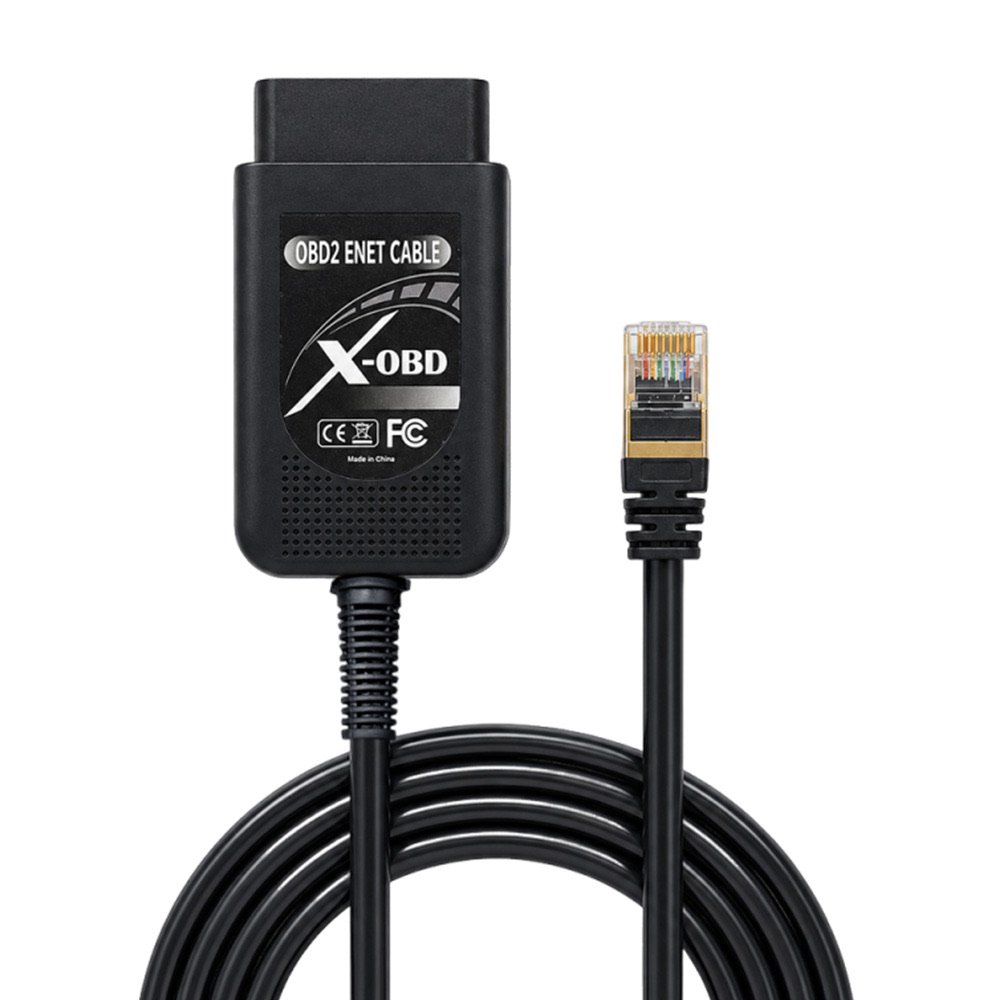 X-OBD ENET adapter close-up showing OBD2 connector and gold-plated RJ45 LAN port